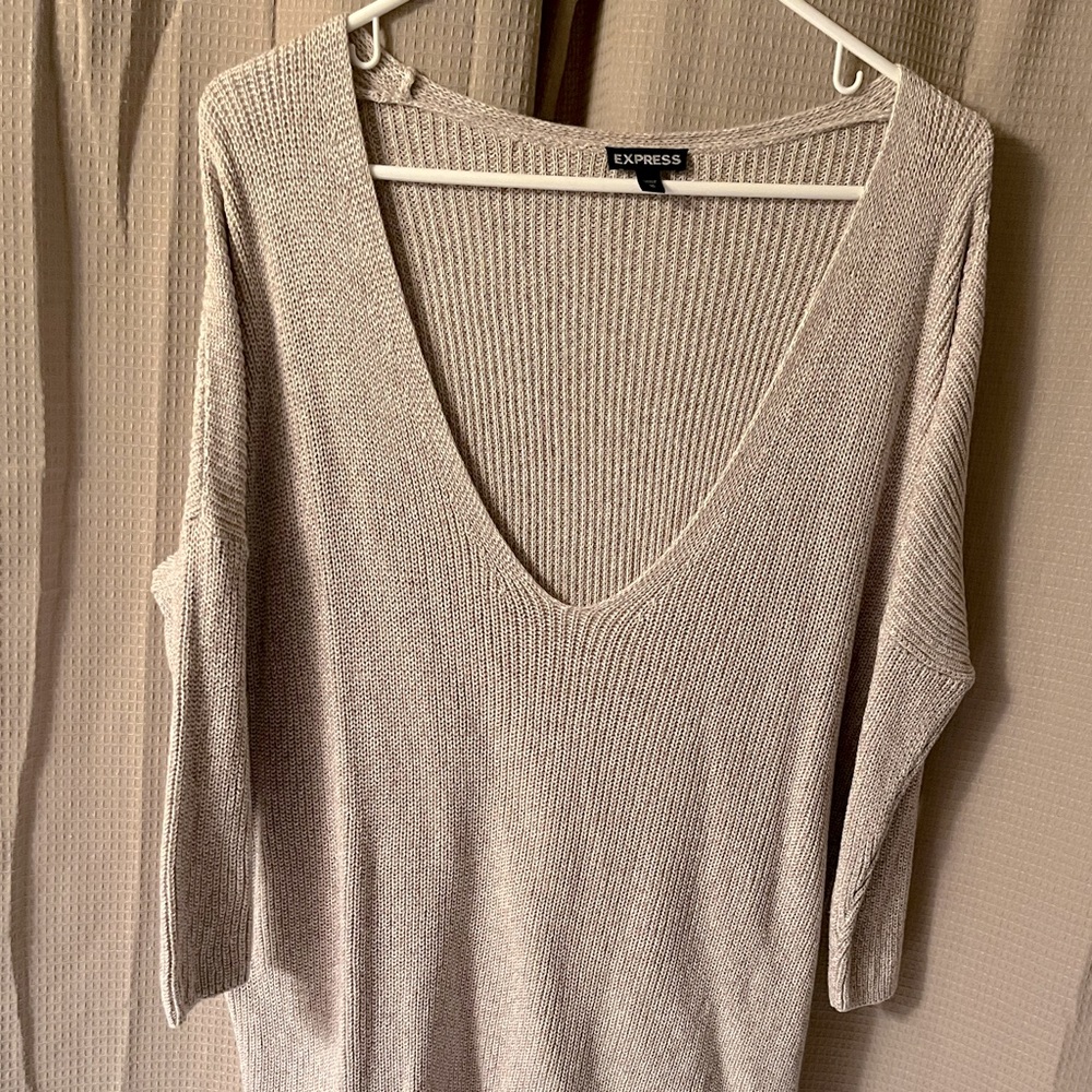 Express V-neck crocheted sweater. 3/4 inch sleeves. Size: Medium